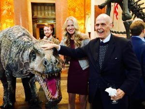 Amanda and Stan pose with a dinosaur at National History Museum