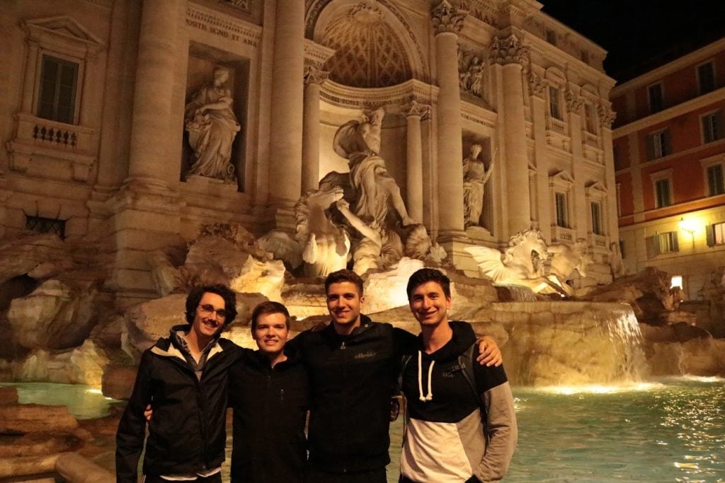 Joshua Turner and 3 other students at the Trevi Fountain in Rome, Italy