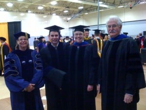 Left to right, Dr. Jackie Huntoon, dean of the graduate school, Cameron Hartnell, his fiancé Dr. Elizabeth Norris, and Dr. Patrick Martin, Cameron's doctoral advisor and chair of the Social Sciences department.