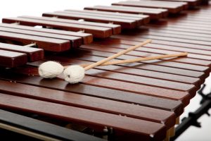 A background of marimba and mallets