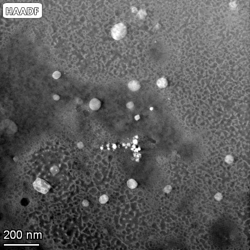 Micrograph on the 200 nm scale showing some of the dot features and the texture of the material.