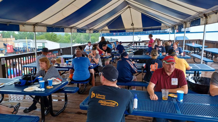 Alumni gather at the 1st Base Pavilion for barbecue before the Whitecaps game