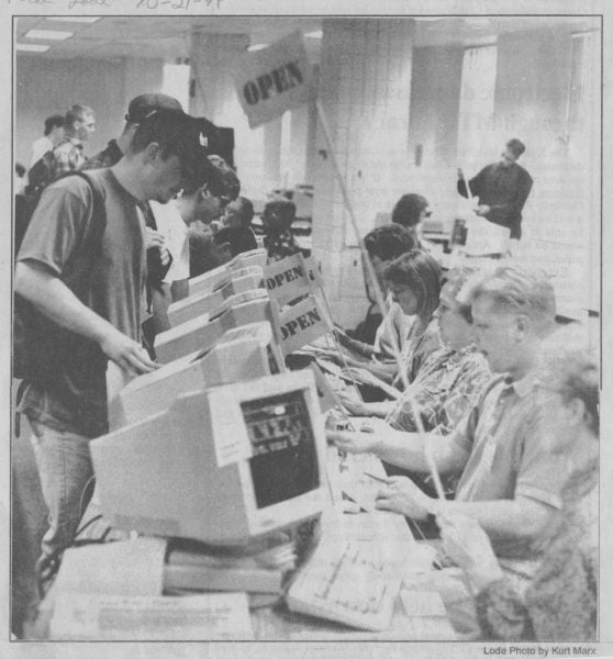 A photo from October 1994 showing students standing in line waiting to schedule classes for the upcoming semester