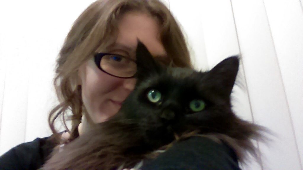 Allyse and her cat, Mr. Basil.