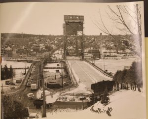 The photo above is a 1960 view from Hancock of the old and current bridges from the John T. Reeder Collection, Michigan Technological University and Copper Country Archives.