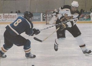 Two hockey players on the ice