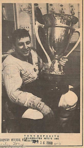 Tony Esposito with 1965 trophy.
