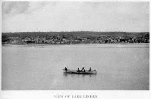 Canoe passing by Lake Linden