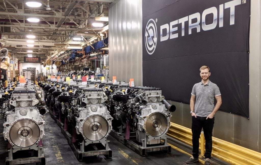 Student Tim Bart poses at Detroit Diesel where he is doing a summer internship