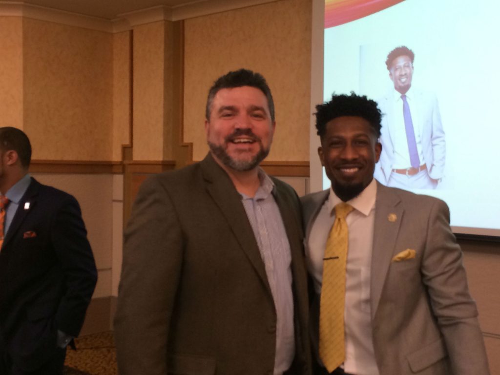 Donzell Dixson poses with Dean Johnson, dean of the Michigan Tech School of Business