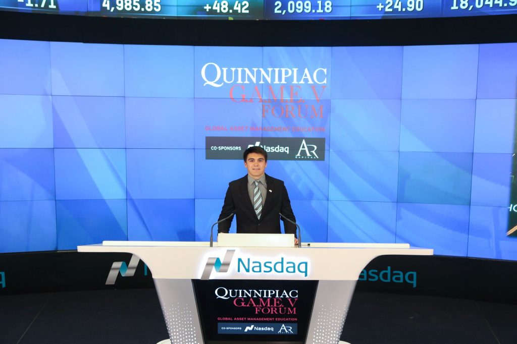 Student stands at Nasdaq