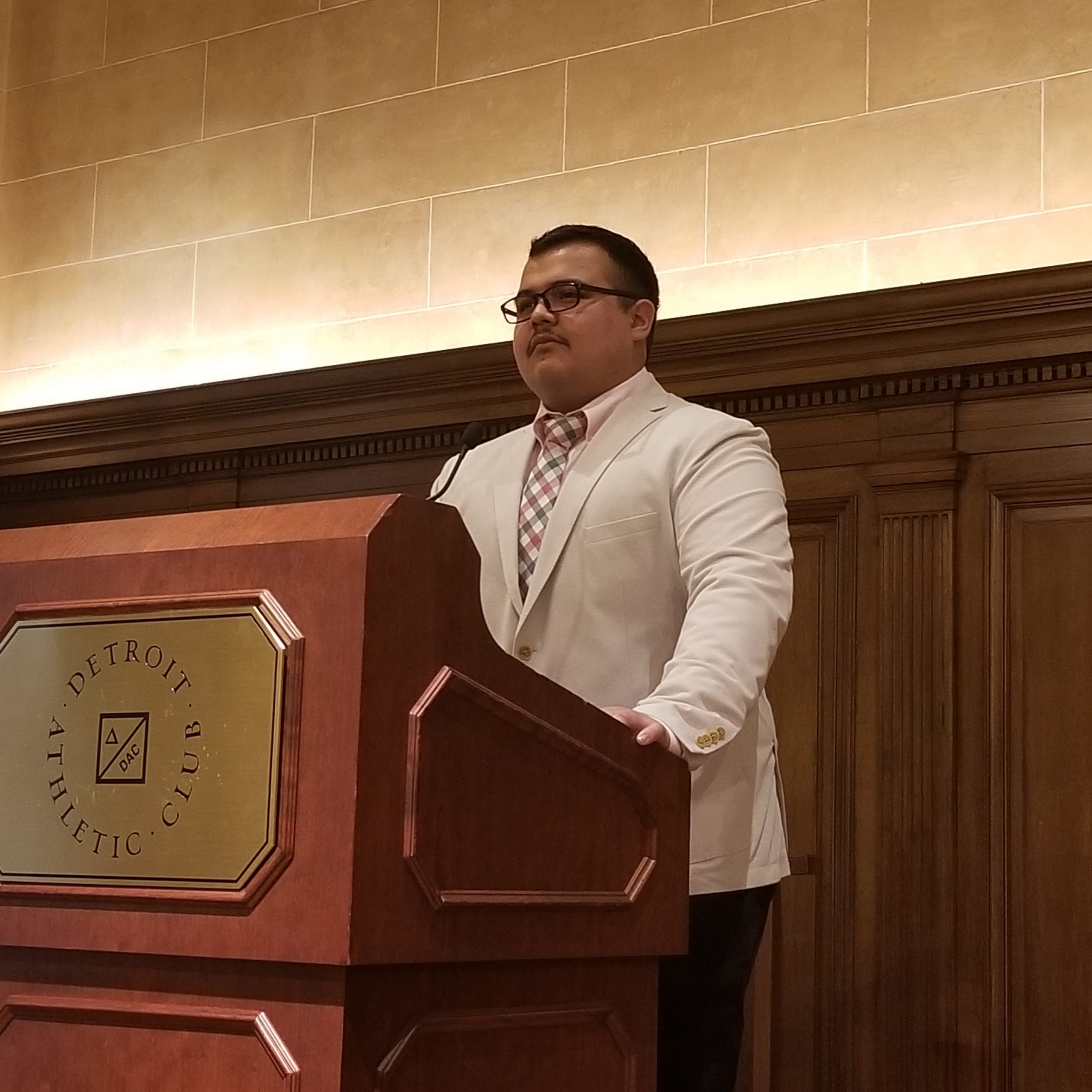 MTU student Marco Marquez stands at a podium