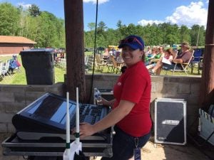 Alex running the light board for the Porterfield Country Music Festival