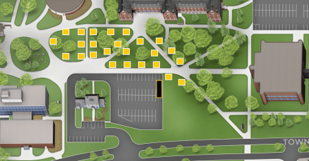 Aerial view of Walker Lawn showing 25 tents between Douglass Houghton Hall and the Walker Arts and Humanities Center.