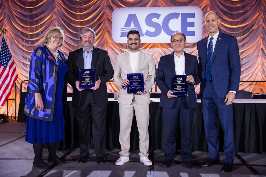 Group of two presenters and three award recipients on the ASCE stage.