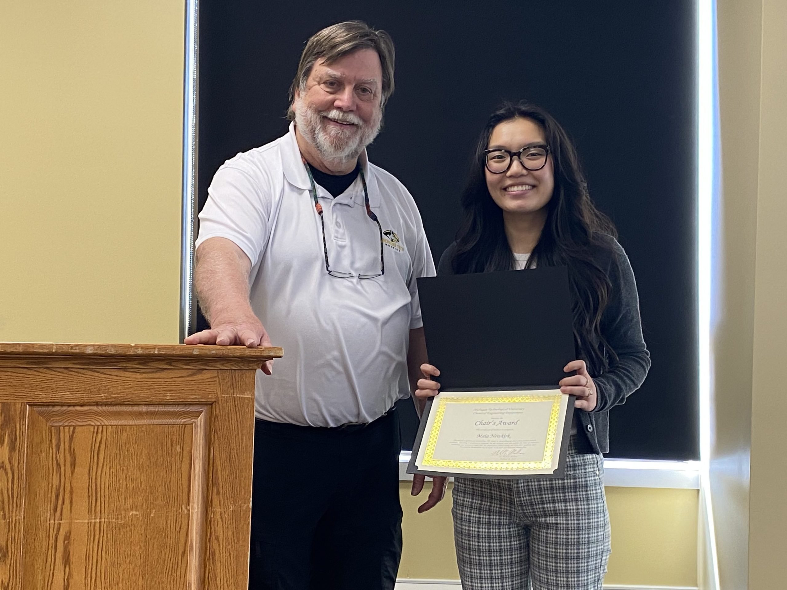 Student receiving the chairs award.