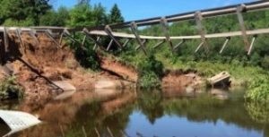 stream with wooden overhang