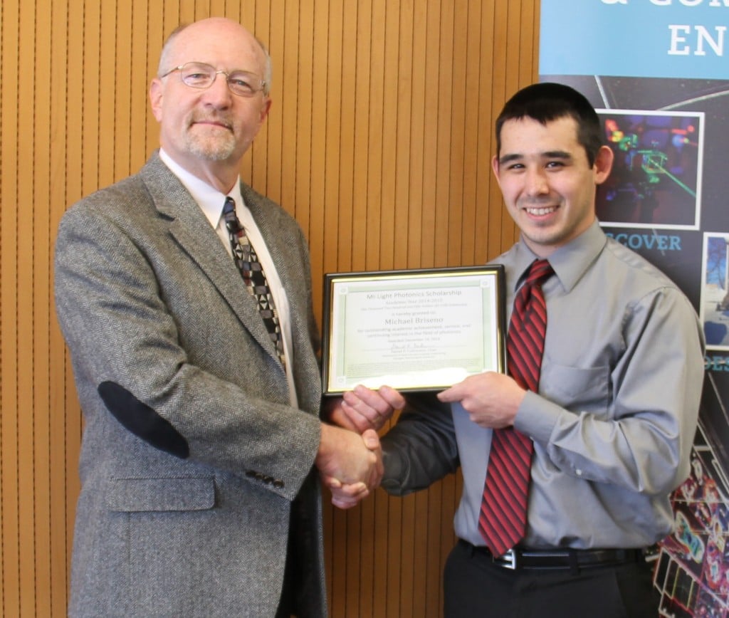 Michael Briseno receives Mi-Light Scholarship award from ECE Chair Dan Fuhrmann