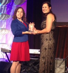 Elizabeth Dreyer (l) receives award from Britta Jost '05 