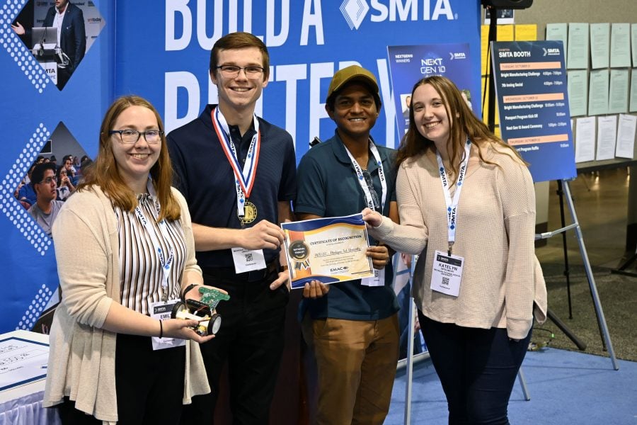 A group photo of three students