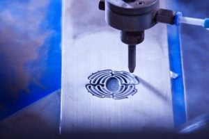 Biodegradable scaffolds are cut with a water jet at Leibniz University Institute of Materials Science