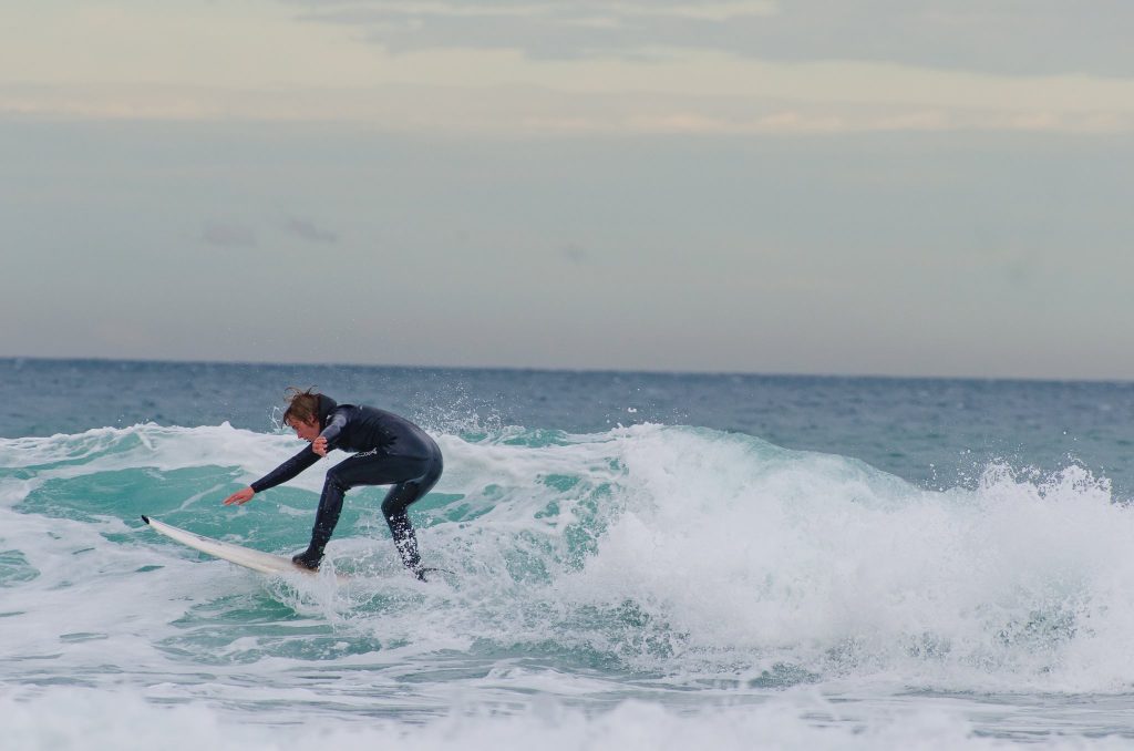 Michigan Tech biomedical engineering student Mitch Kirby surfs in New Zealand. "Traveling and living abroad while studying and working in the lab showed me that it is possible to mix work and play so that each day is an enjoyable one.” 