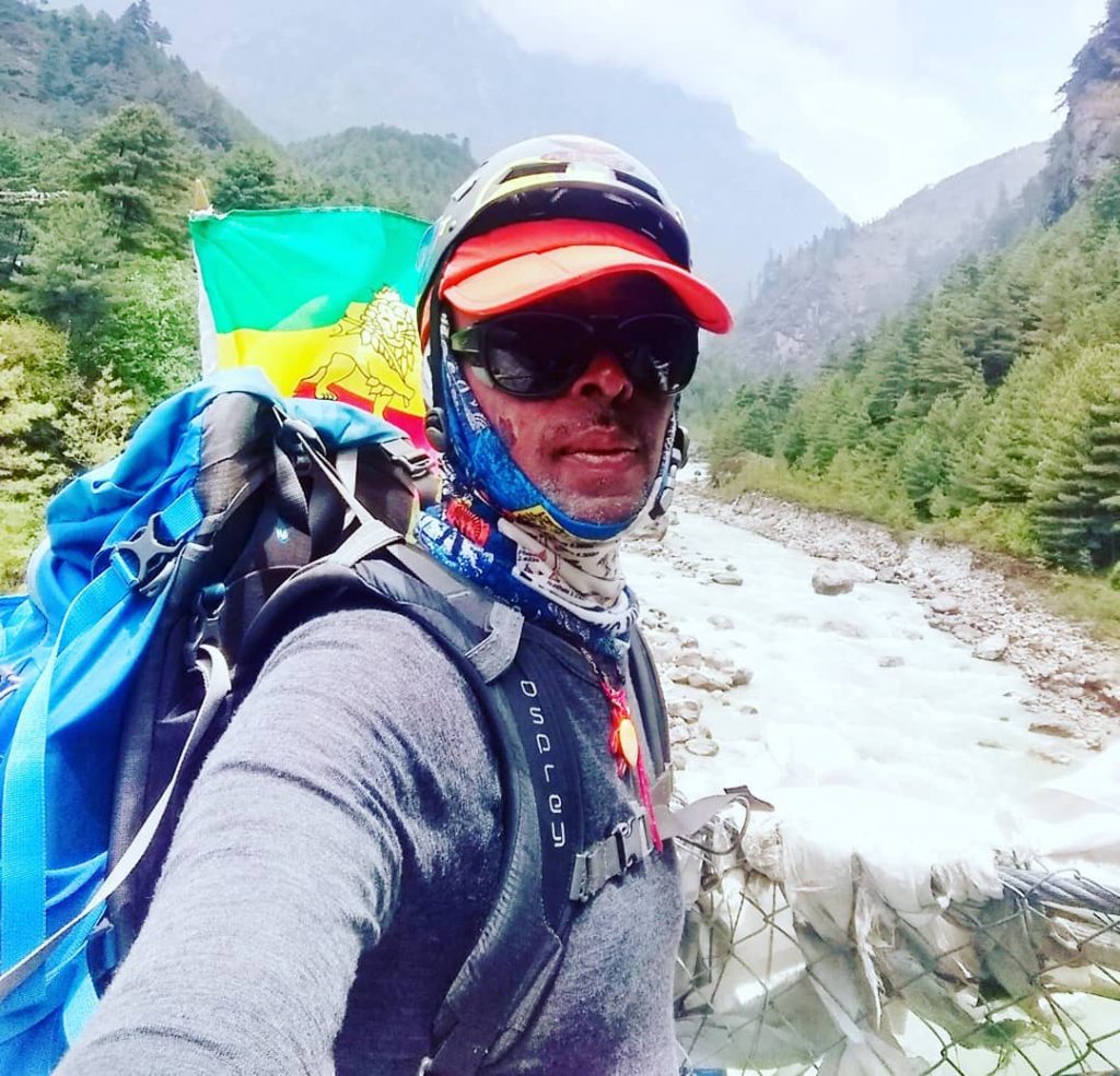 On the way back down, at one of the many suspension bridges, Seyoum takes a final selfie