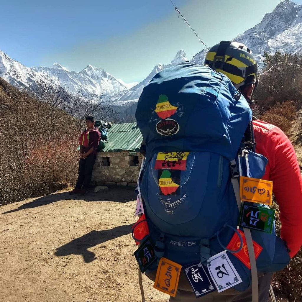 Sirak with heavy backpack n the trail, shortly after leaving Hotel Everest View at about 13,000 ft.