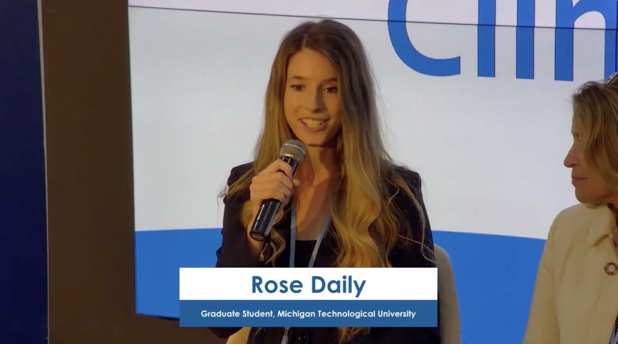 Rose Daily, Graduate Student, Michigan Technological University, speaking on stage.