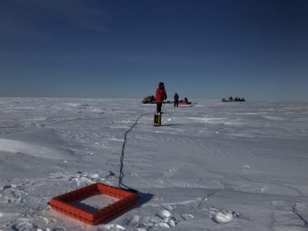 Time-Domain Electromagnetic (TDEM) survey equipment in the tundra.