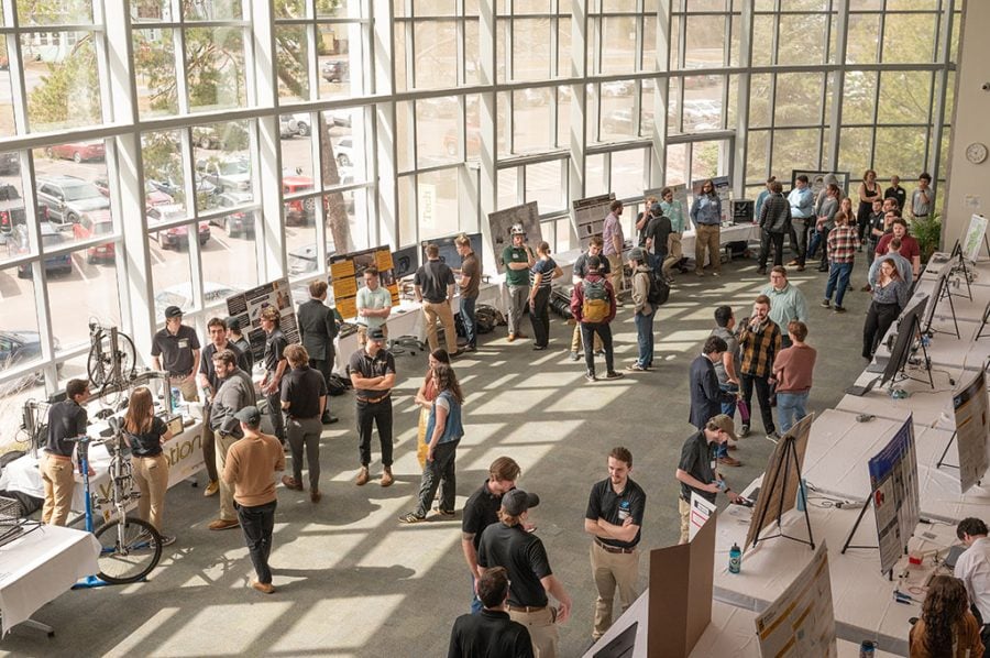 Overhead photograph of the atrium in the Van Pelt Opie Library with student project presentation on display