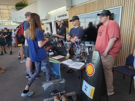 students talking to other students about the Enterprise Program