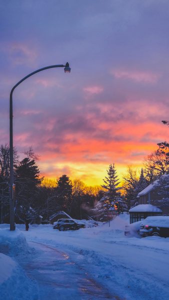 A sunset overlooking a residential complex