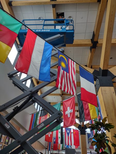 Maintenance taking place on the ceiling of the atrium