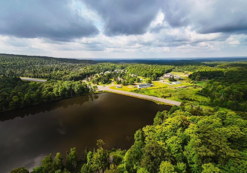 An aerial view of the Ford Center Sawmill and surrounding forest.
