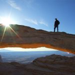 AGU Bridge Program showing a person walking on a natural bridge