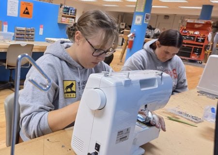 Students in the Maker Space using the Sewing machines