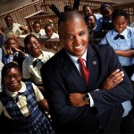 Otha Thornton shares an exuberant moment with students of the Scholars Academy Charter School in Riverdale, Georgia. Photo: Quantrell Colbert