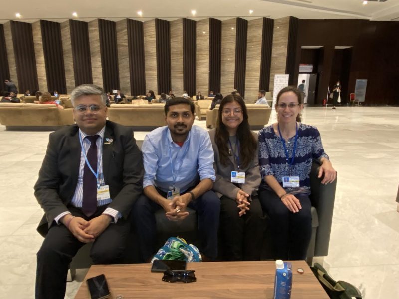 Kathy Huerta Sanchez sitting on a couch with 3 other COP27 attendees