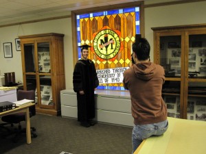 UMC photographer works to capture just the right image of recent graduate Dr. Cameron Hartnell.