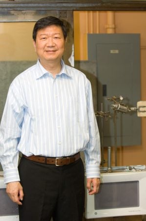 Jim Hwang stands in his lab.