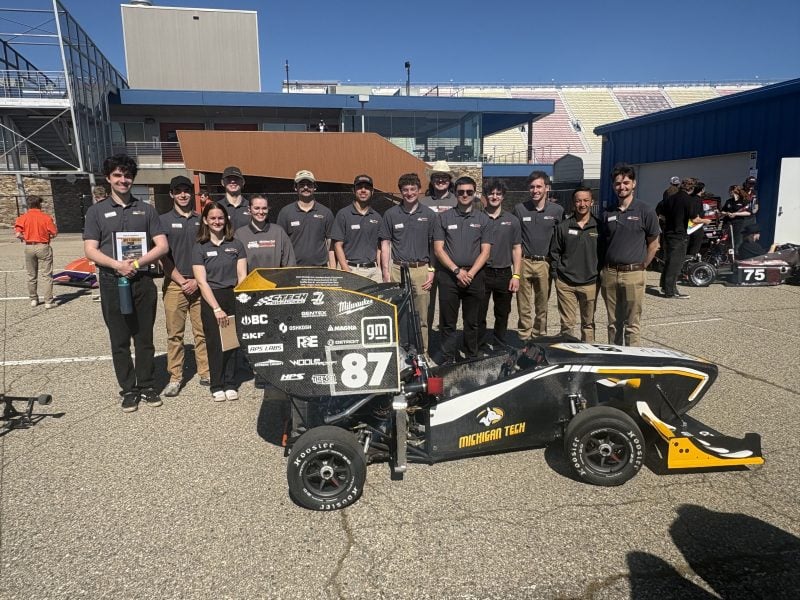 Michigan Tech Formula SAE team with their car, May 2026.