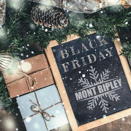 Gifts and greenery with Chalkboard with text Black Friday and the Mont Ripley logo