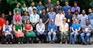 Lynn and Claudio Mazzoleni posing with a large group of researchers in India