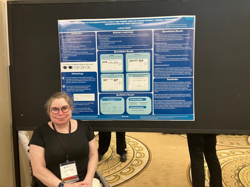 Jen Shaud standing beside her research poster "Perceptions of Accommodations: Faculty and Student Views on Course Integrity, Fairness, Knowledge Demonstration and Credit Equivaliency”