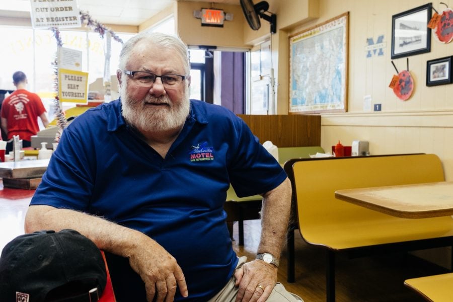 Larry Lankton sitting in a diner.
