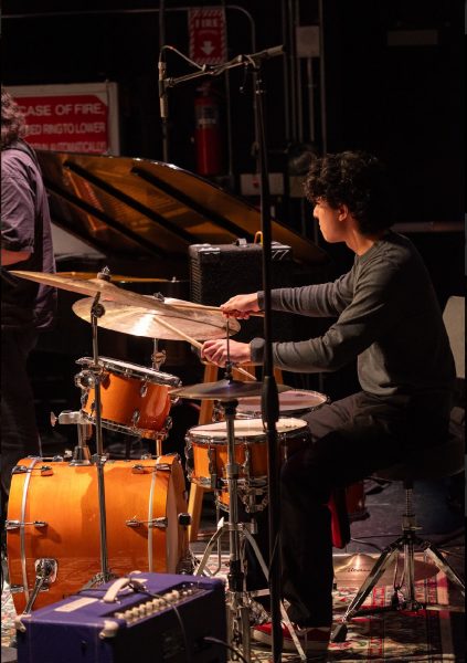 Nico Chua playing the drums